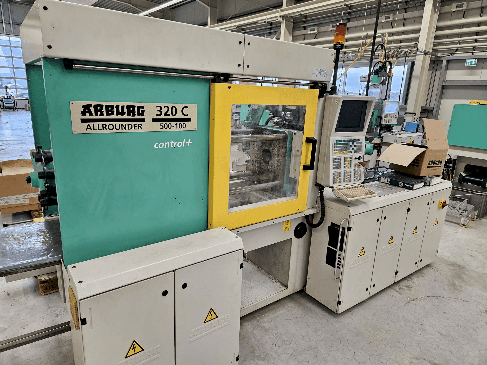 Makine  Arburg 320 C 500-100 + Multilift H with B-Axis - Önden görünüm