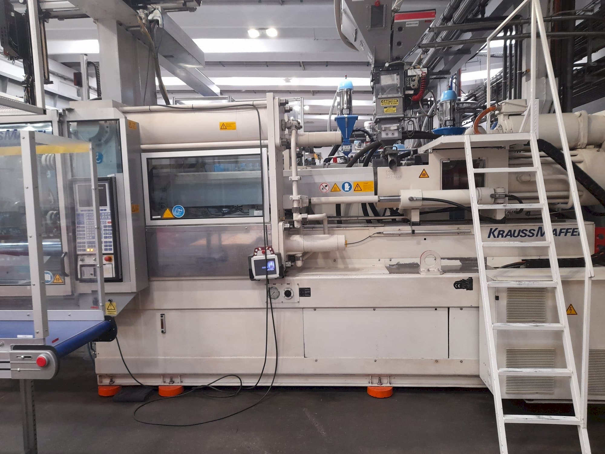 Makine  Krauss Maffei KM 450-3500 C3 - Önden görünüm