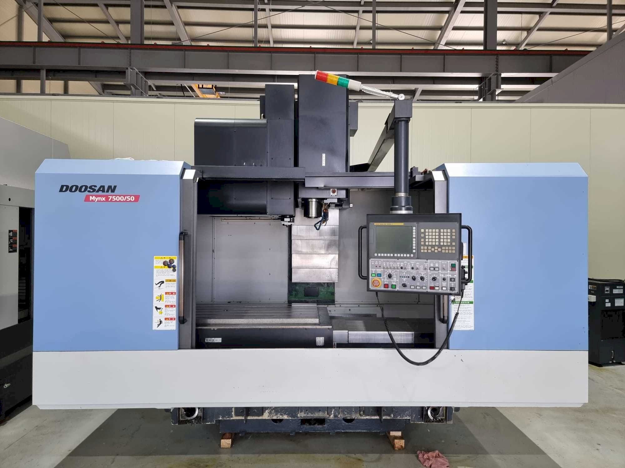 Makine  Doosan Mynx 7500/50 - Önden görünüm
