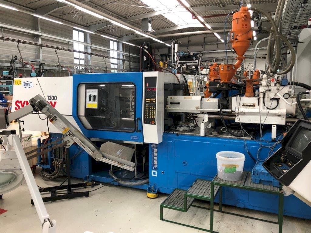 Makine  Netstal Synergy S1200-230 - Önden görünüm