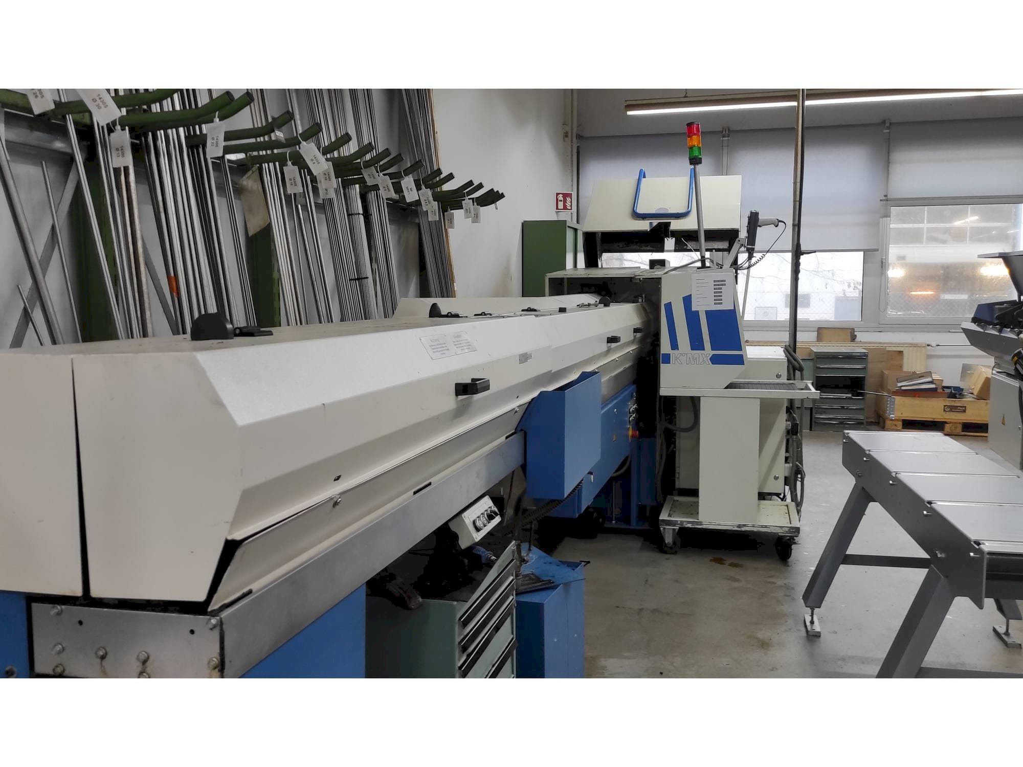 Makine  Manurhin KMX 226 with FMB bar loader - Sol görünüm