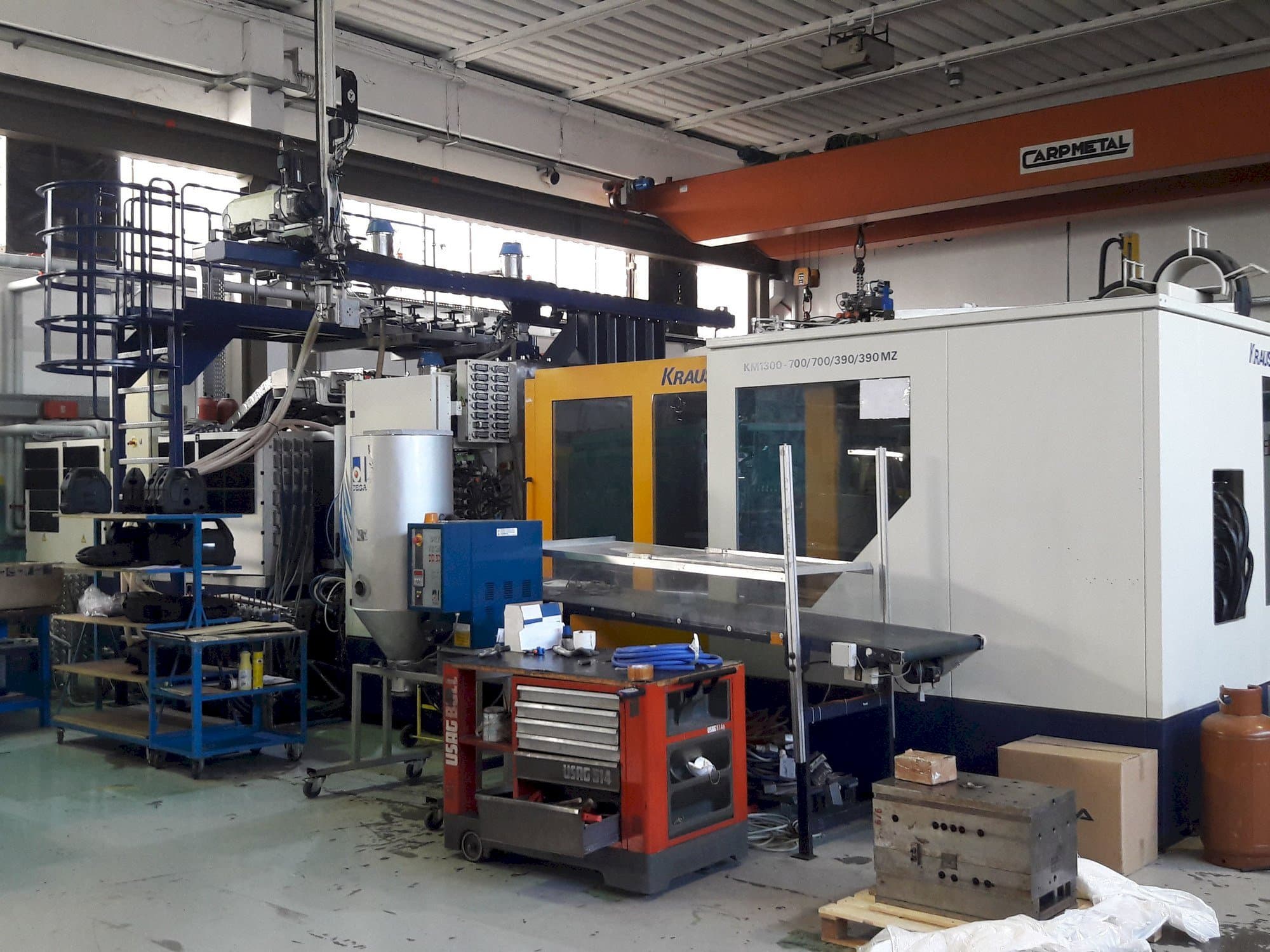 Makine  Krauss Maffei 1300-700-700-390-390 MZ - Önden görünüm