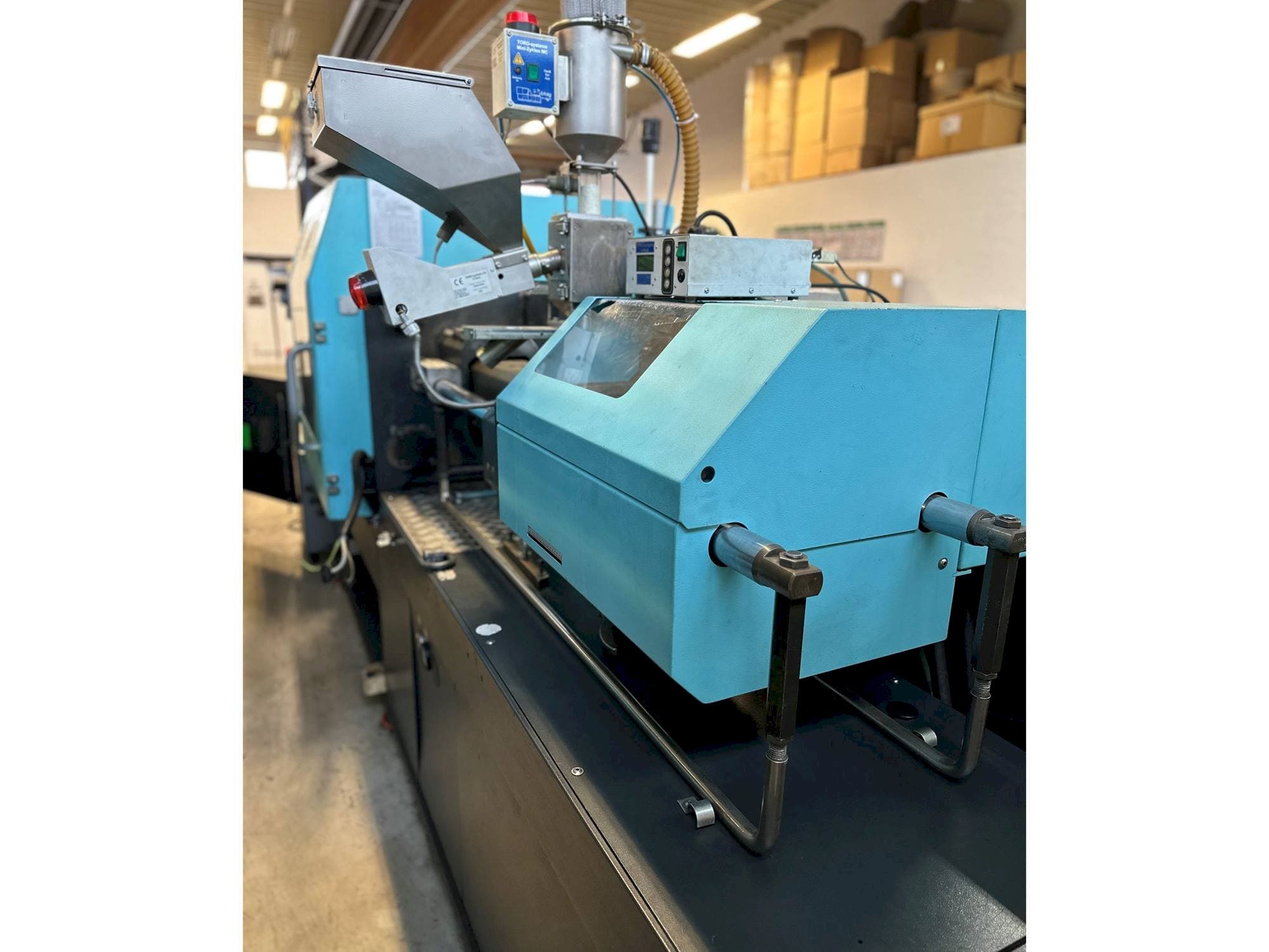 Makine  DEMAG Concept 80/370-120 - Önden görünüm