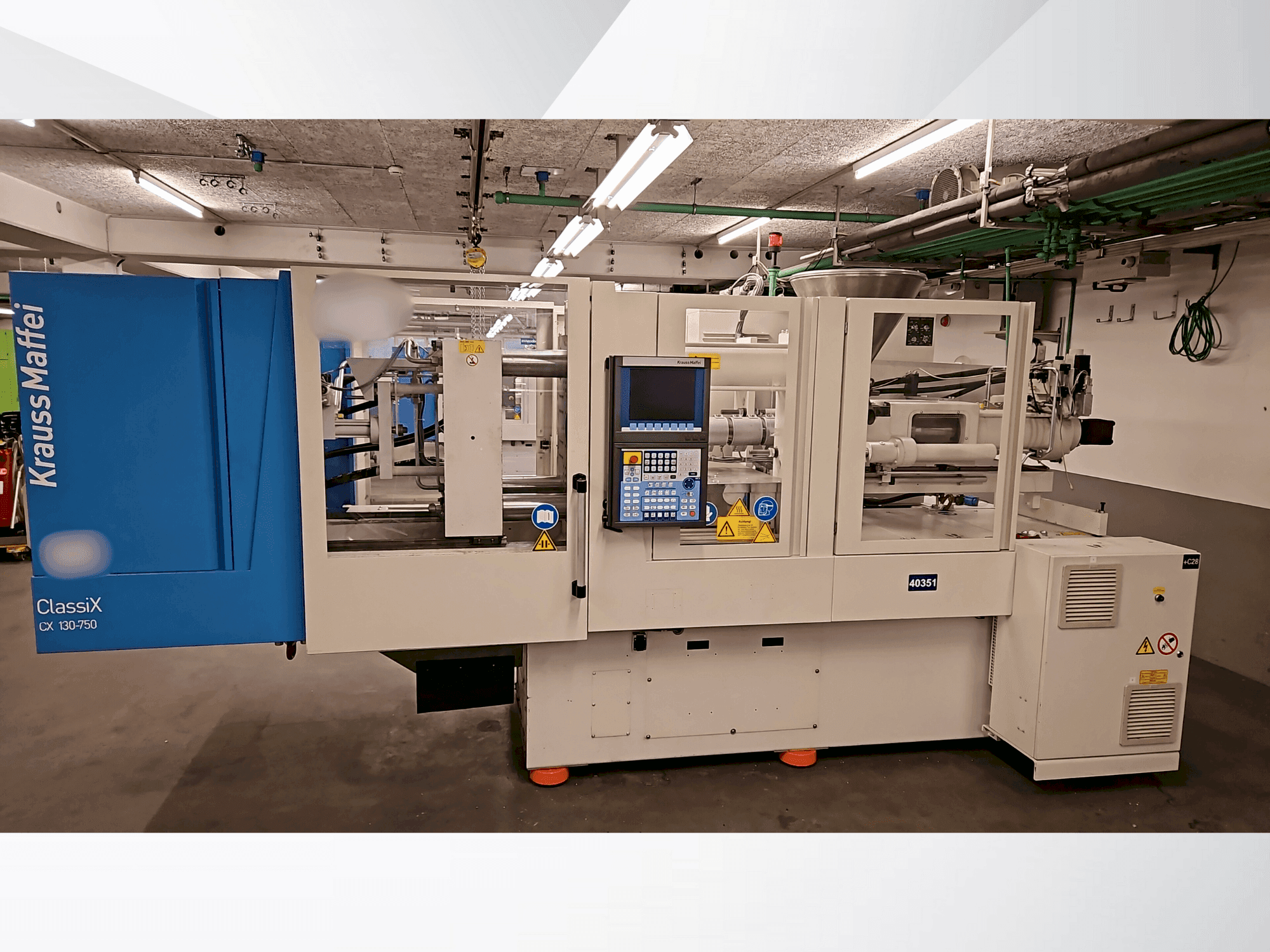 Makine  Krauss Maffei 130-750 CX - Önden görünüm