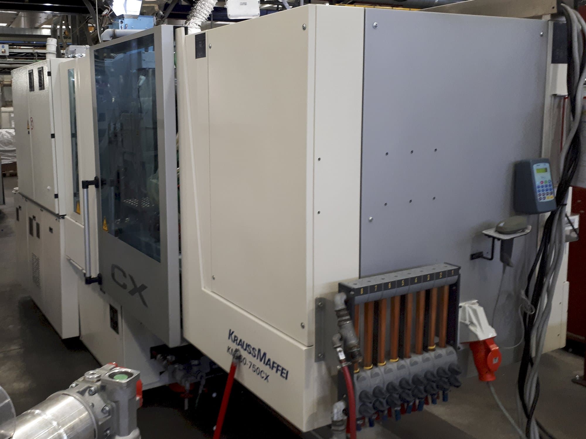 Makine  Krauss Maffei - Önden görünüm 160-750 CX