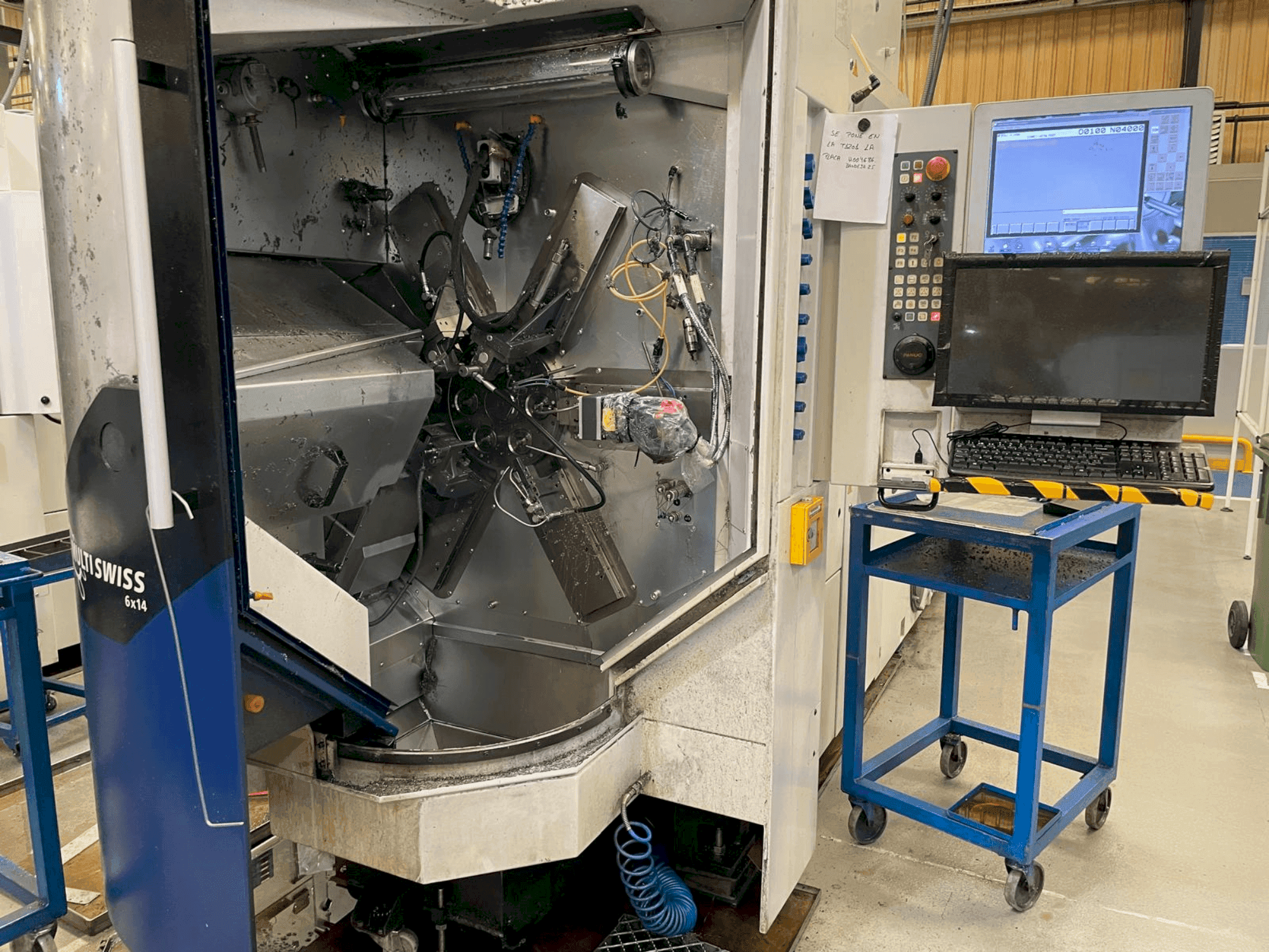 Makine  TORNOS MultiSwiss 6x14 - Önden görünüm