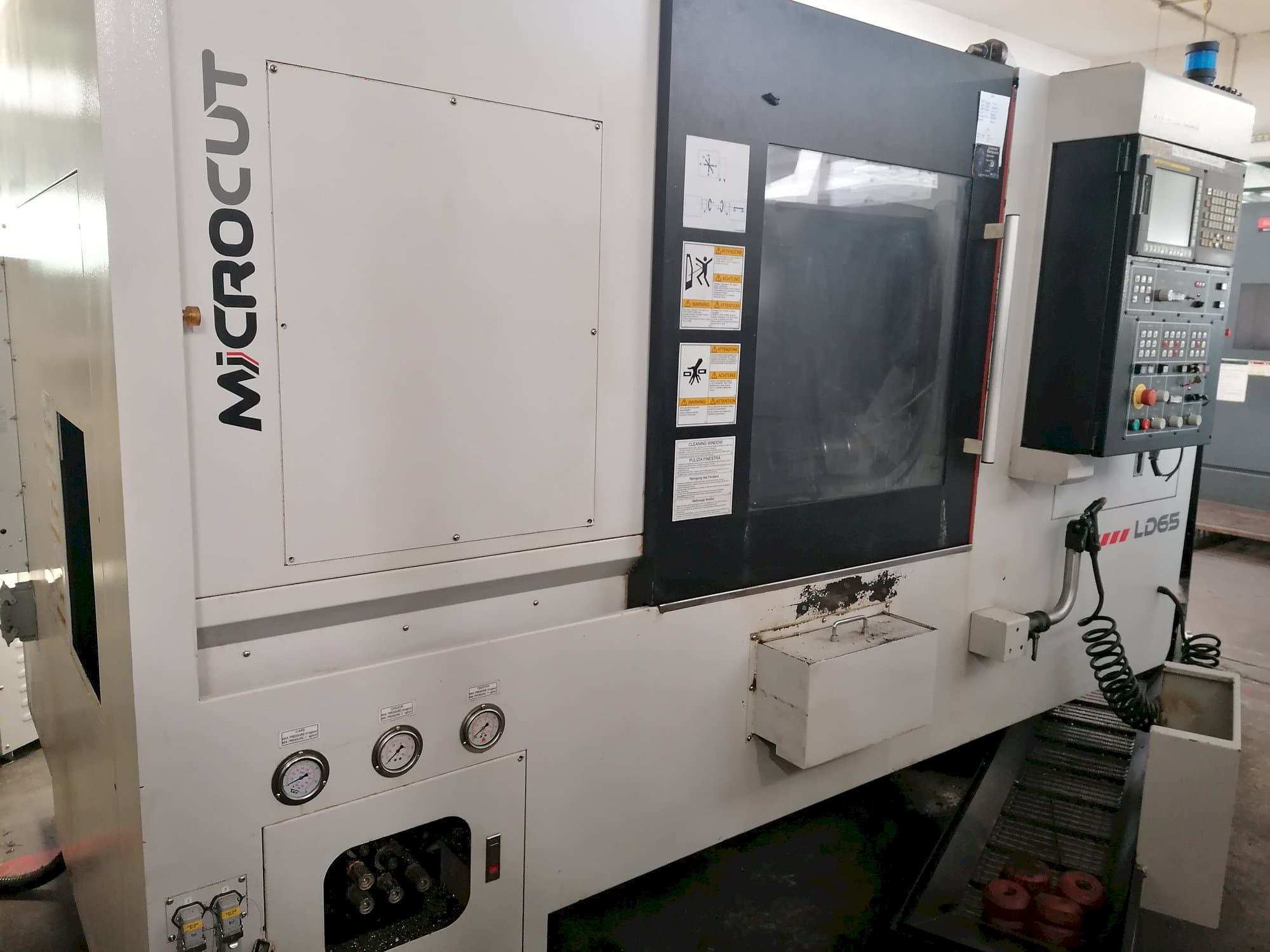 Makine  MICROCUT LD-65 - Önden görünüm