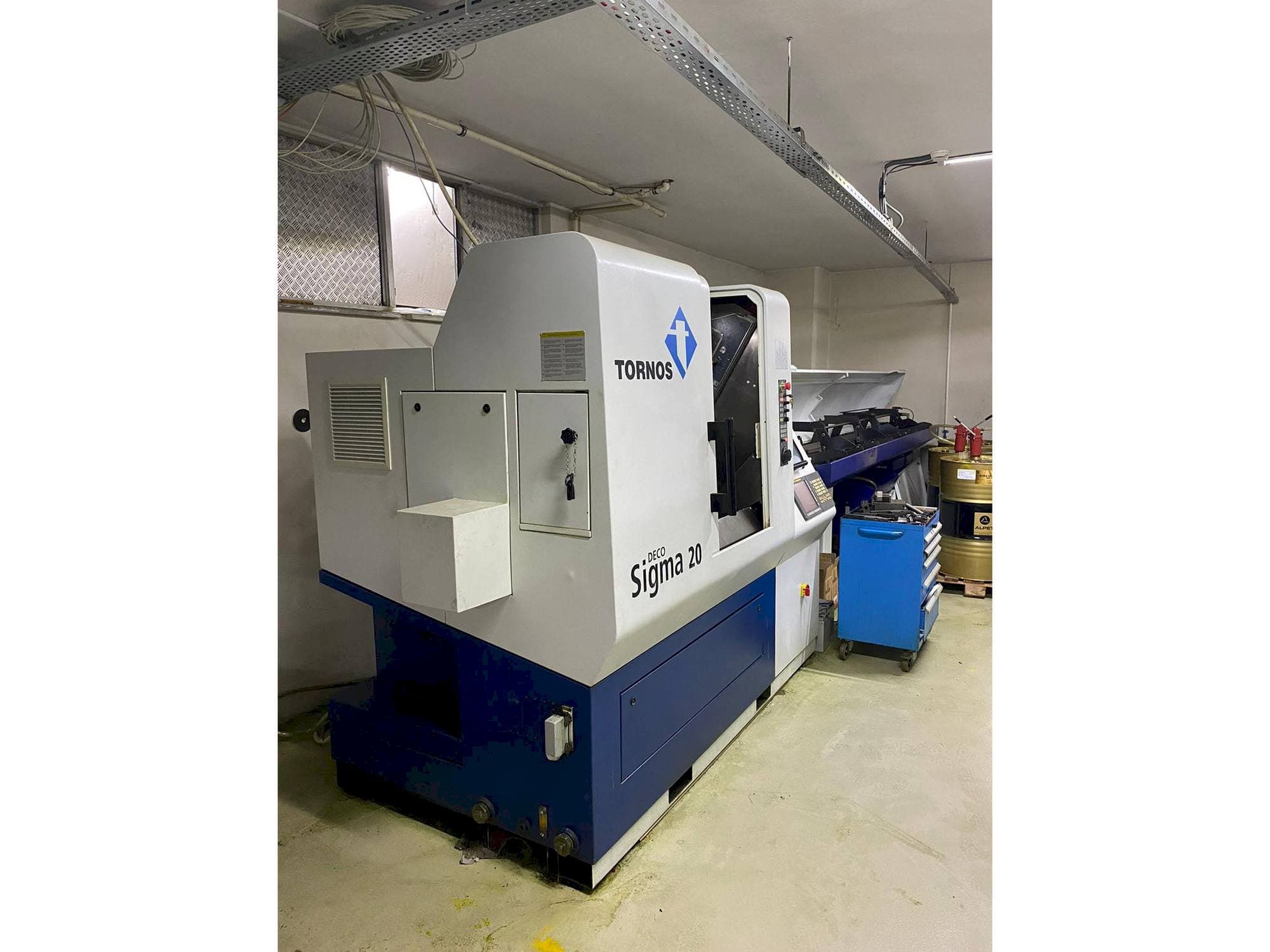 Makine  Tornos Delta Sigma 20 - Sol taraftaki görüntü