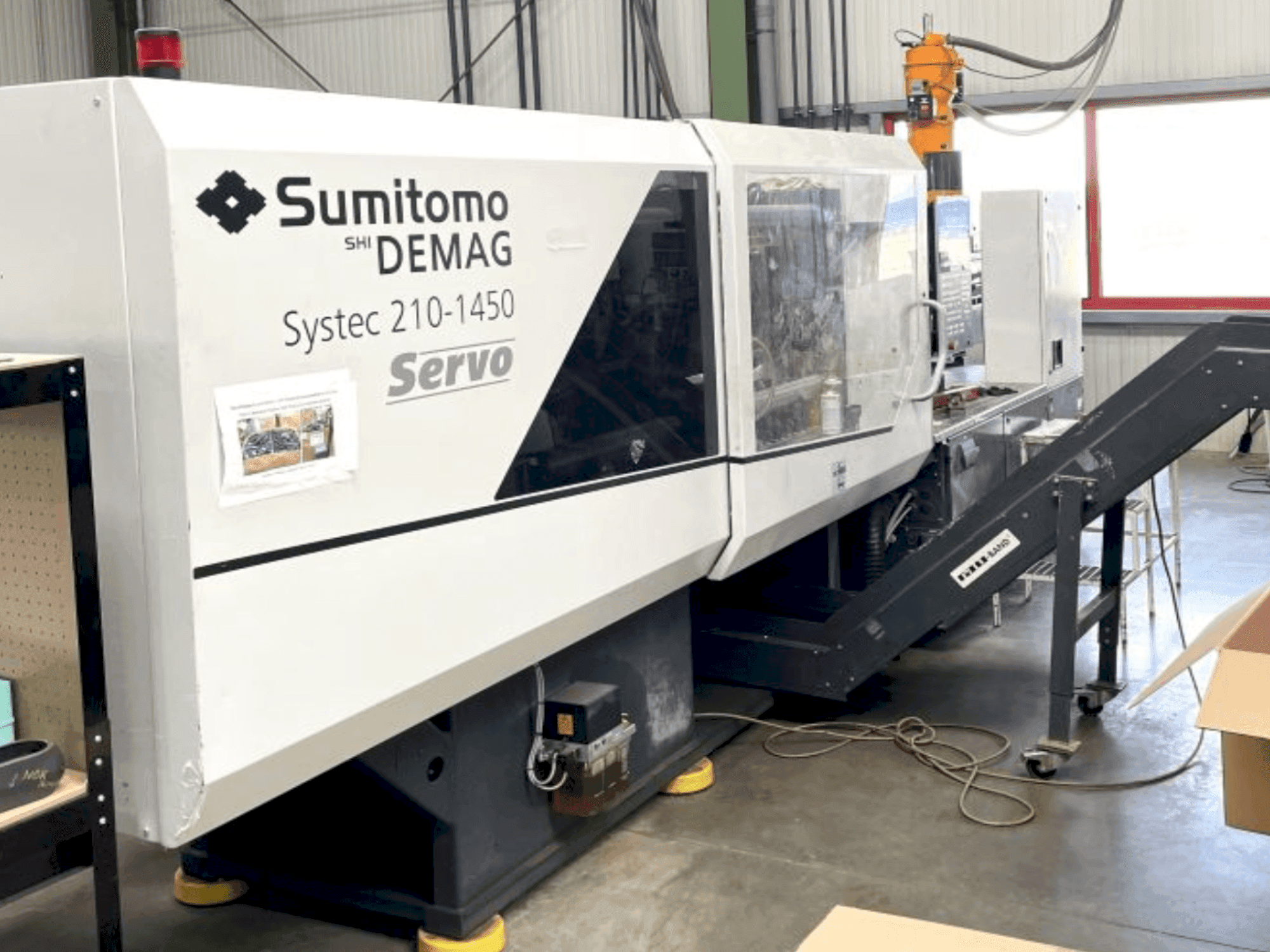 Makine  DEMAG System 210-1450 - Önden görünüm