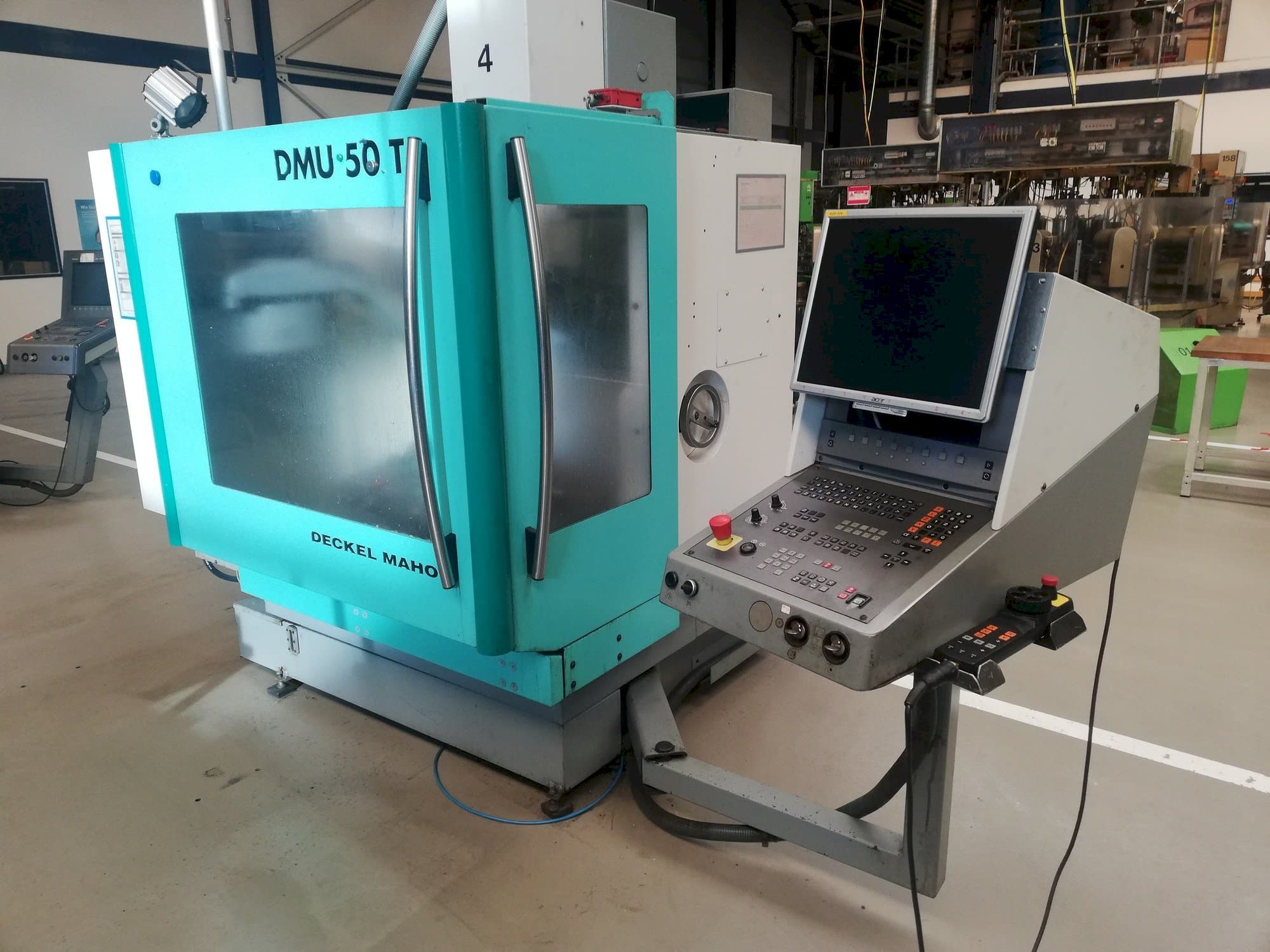 Makine  DECKEL MAHO DMU 50T - Önden görünüm