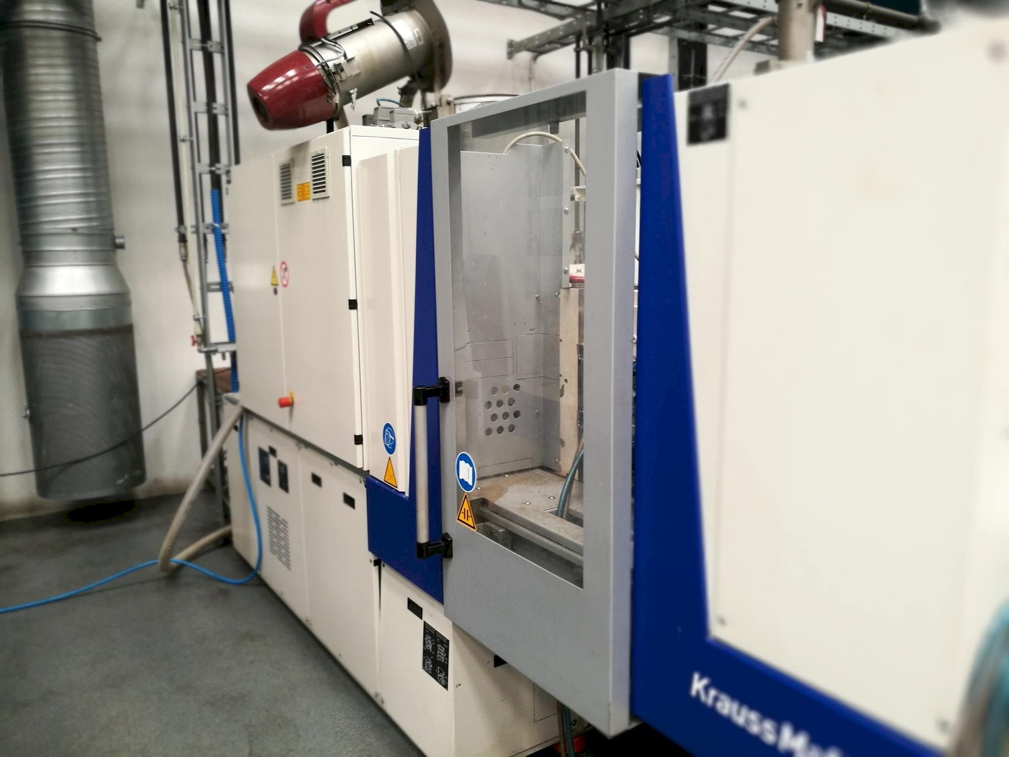 Makine  Krauss Maffei KM 35-55 CX - Önden görünüm