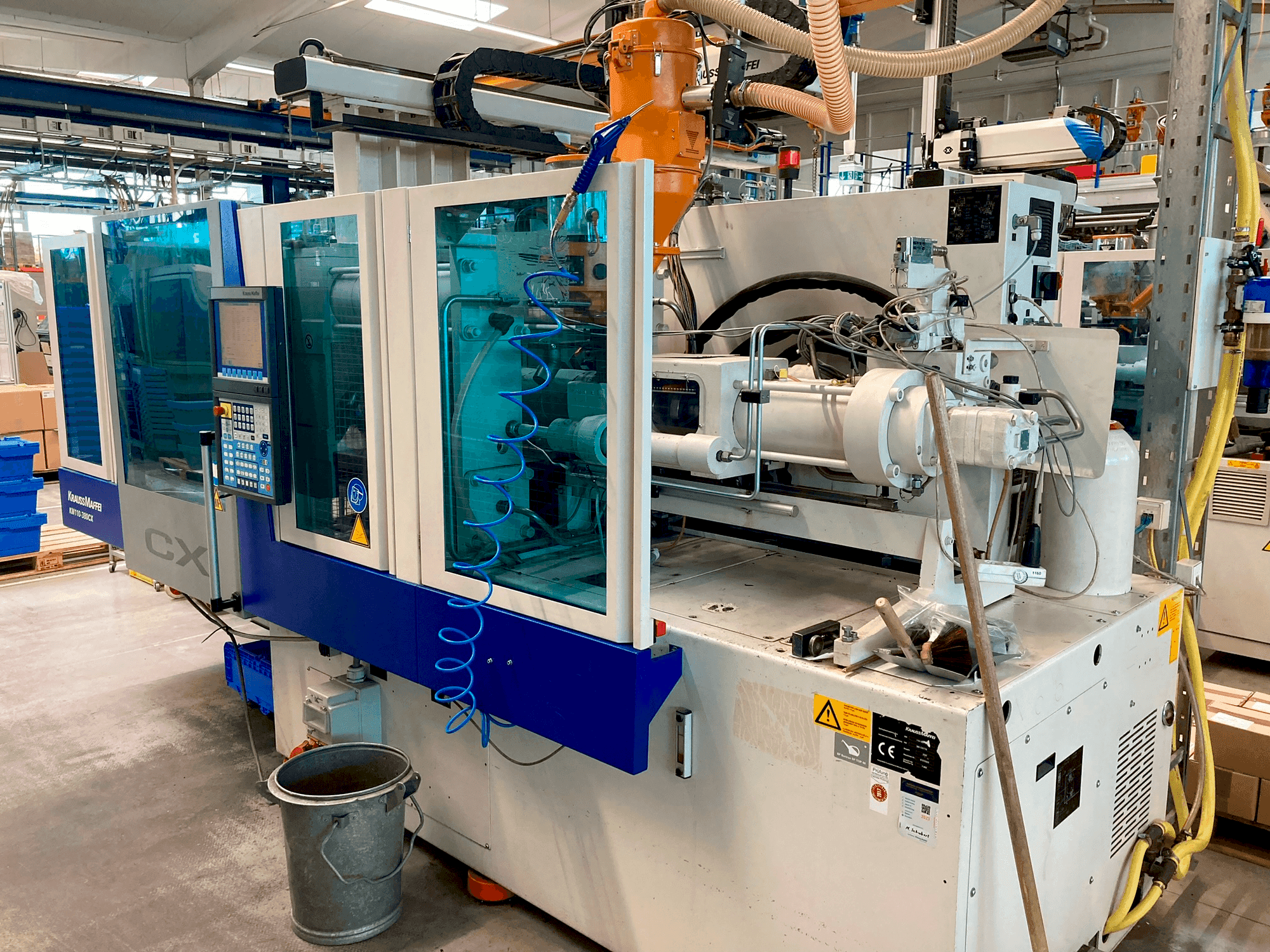 Makine  Krauss Maffei 110–380 CX - Önden görünüm