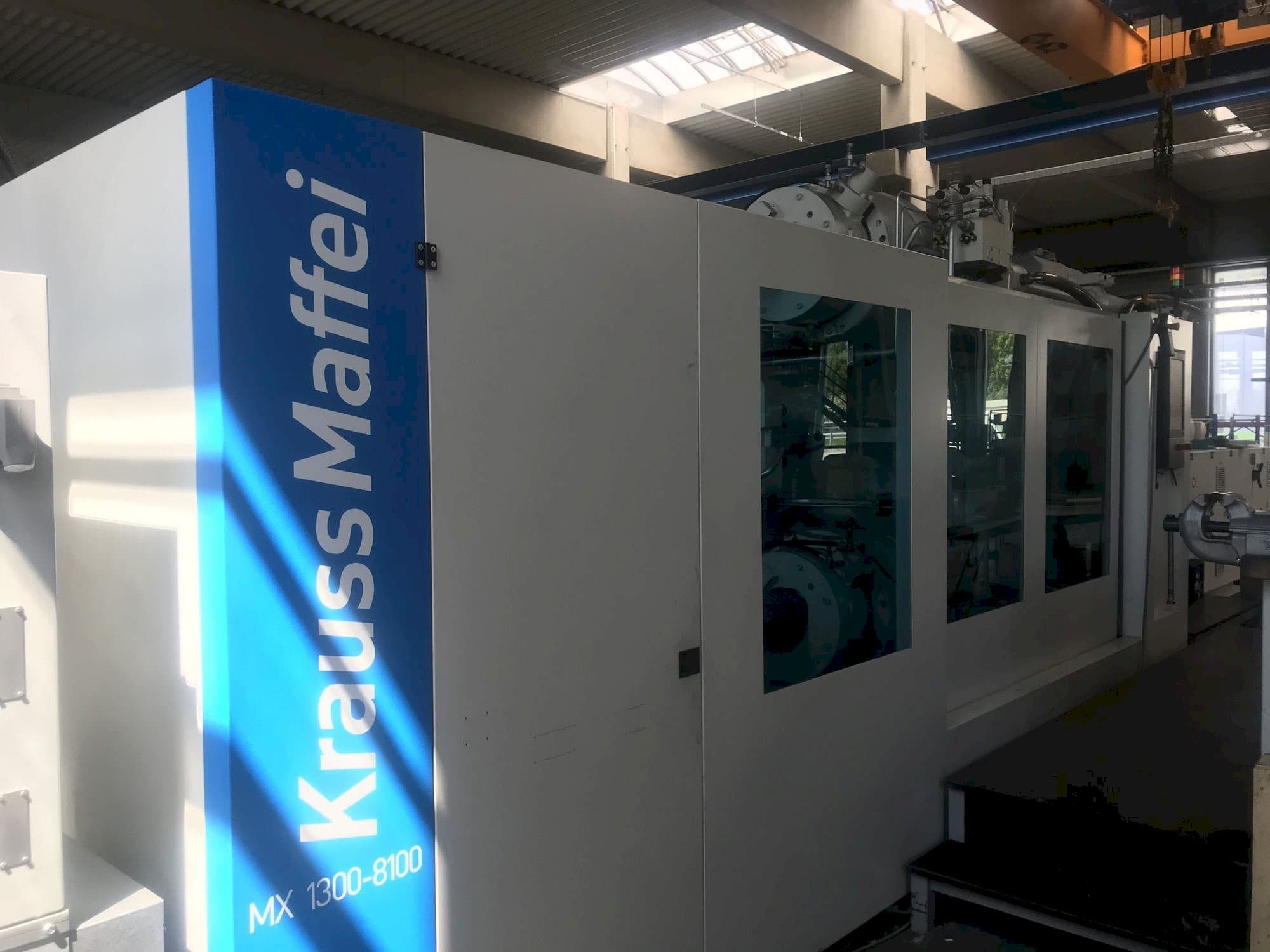 Makine  Krauss Maffei 1300-8100 MX - Önden görünüm