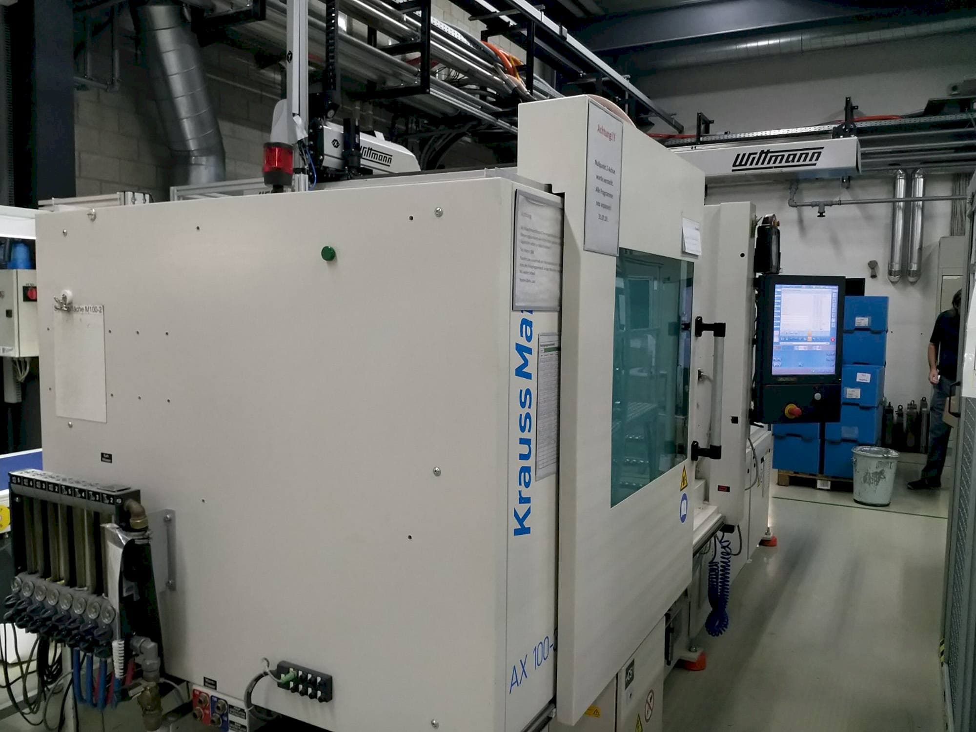 Makine  Krauss Maffei 100-380 AX - Önden görünüm