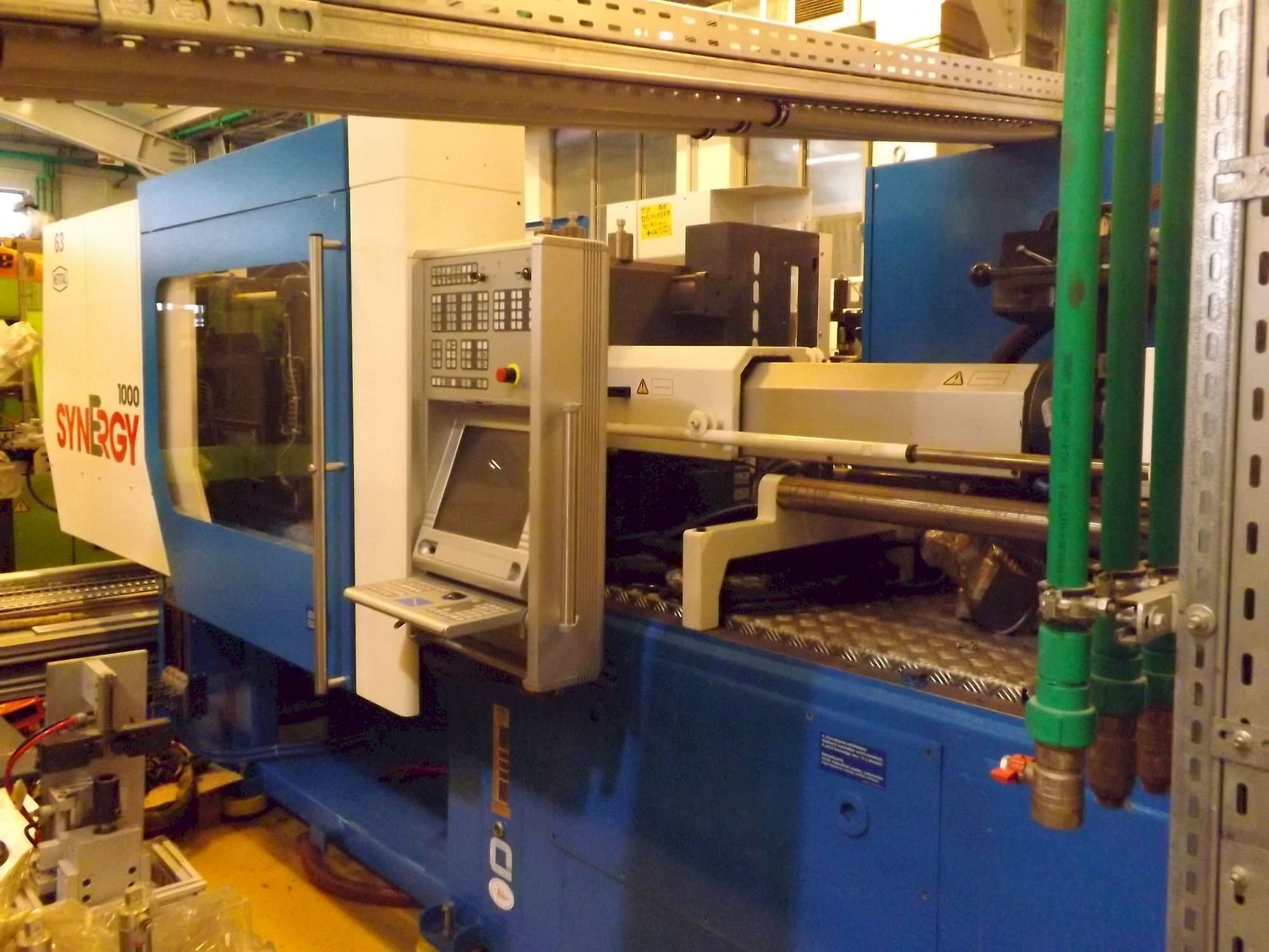 Makine  Netstal Synergy 1000 230-110 - Önden görünüm