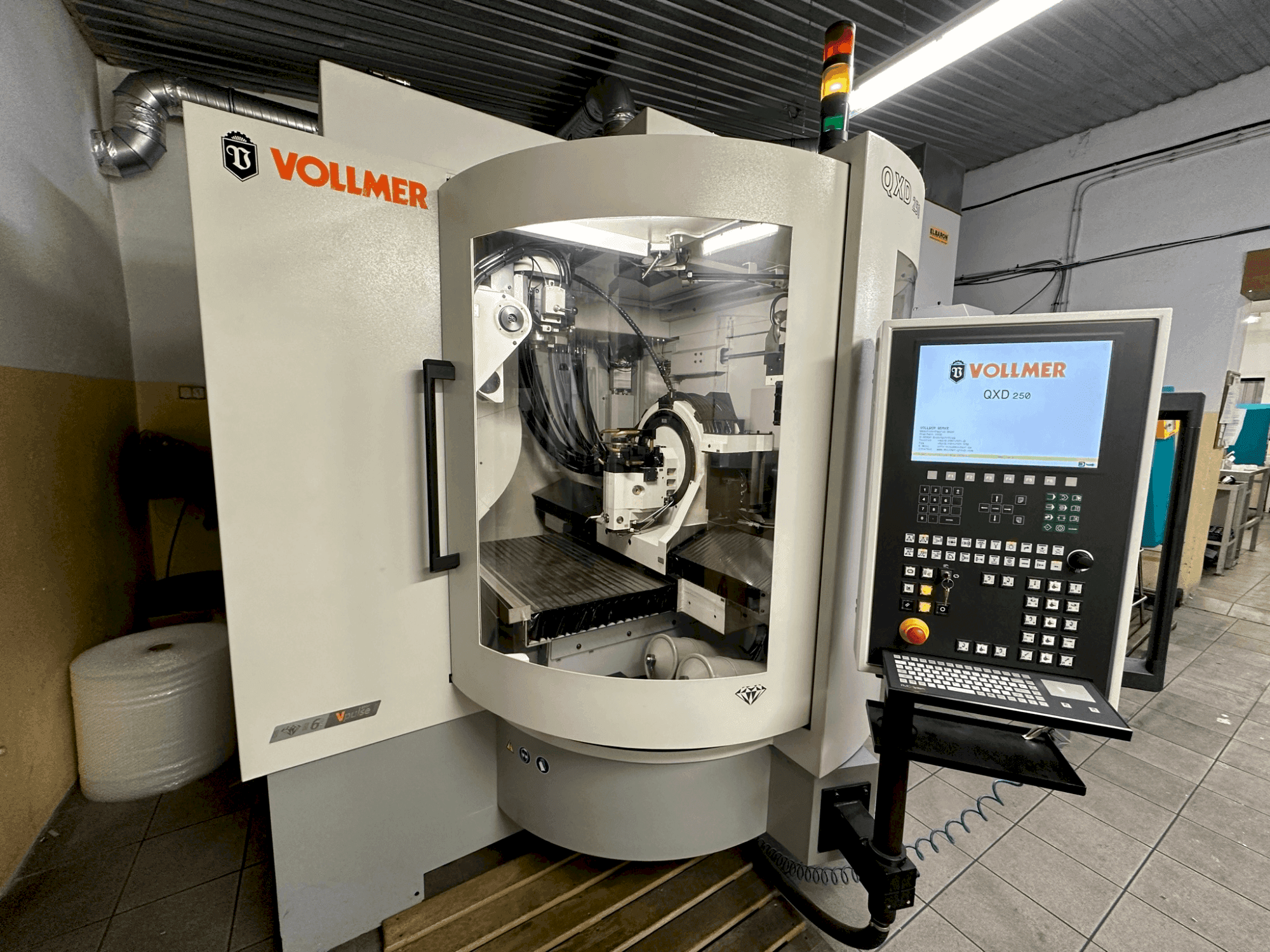 Makine  VOLLMER QXD 250 - Önden görünüm