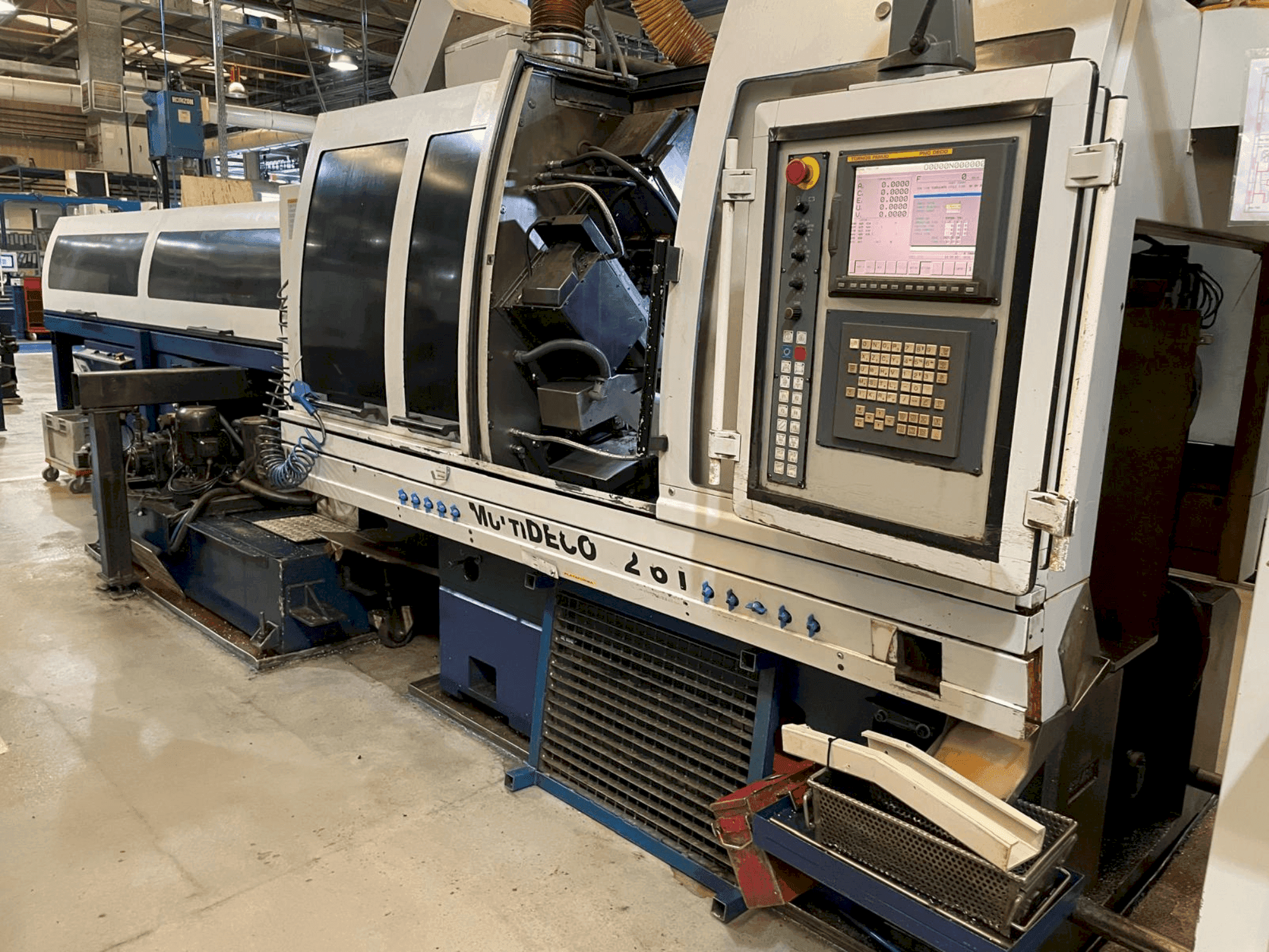 Makine  TORNOS MultiDeco 32-6i - Önden görünüm