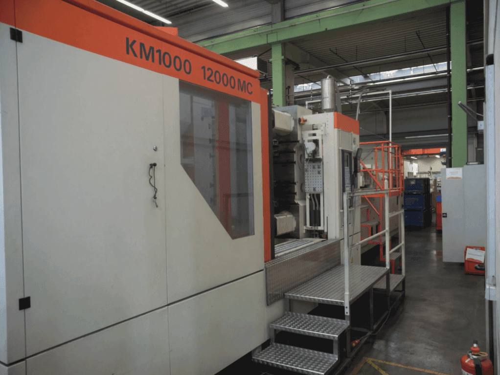 Makine  Krauss Maffei 1000-12000 MC - Önden görünüm