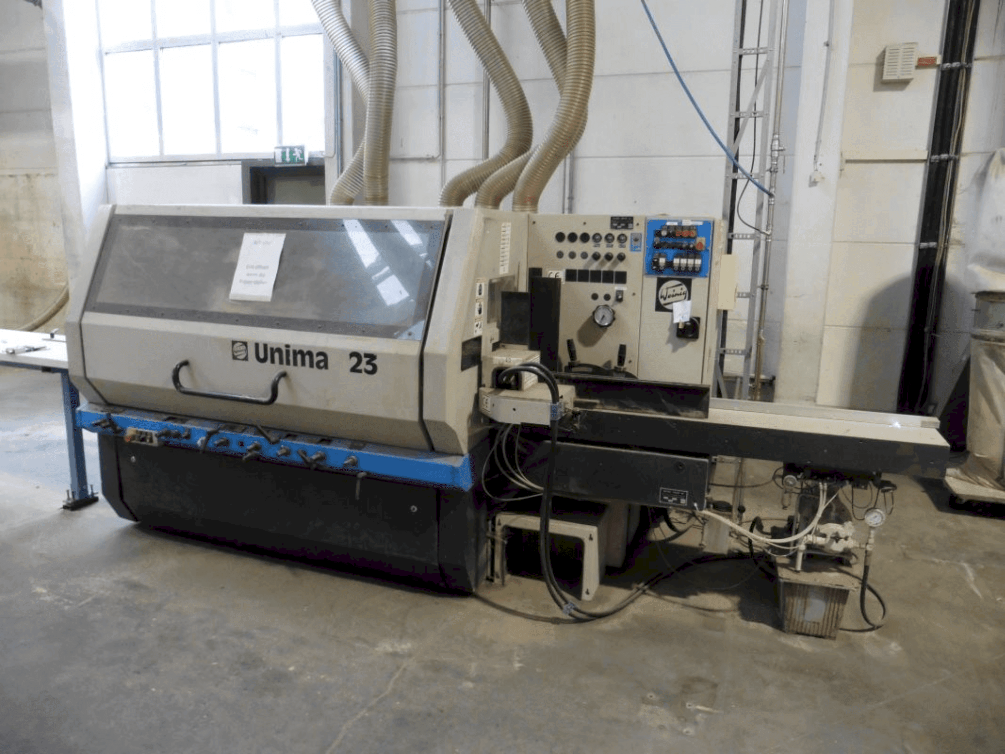 Makine  WEINIG / DIMTER Unimat 23 E - Önden görünüm