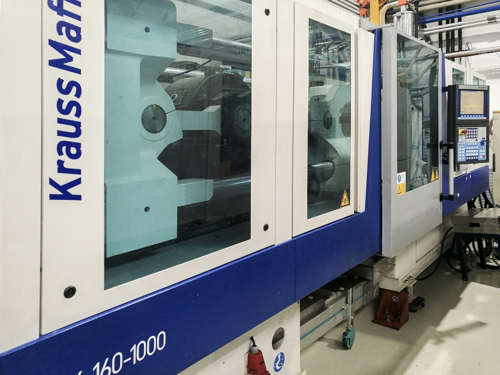 Makine  Krauss Maffei - Sol görünüm 160-1000 EX