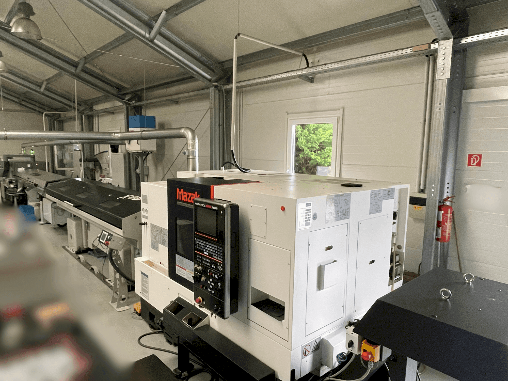 Makine Mazak Quick Turn Nexus 200-II MS - Önden görünüm