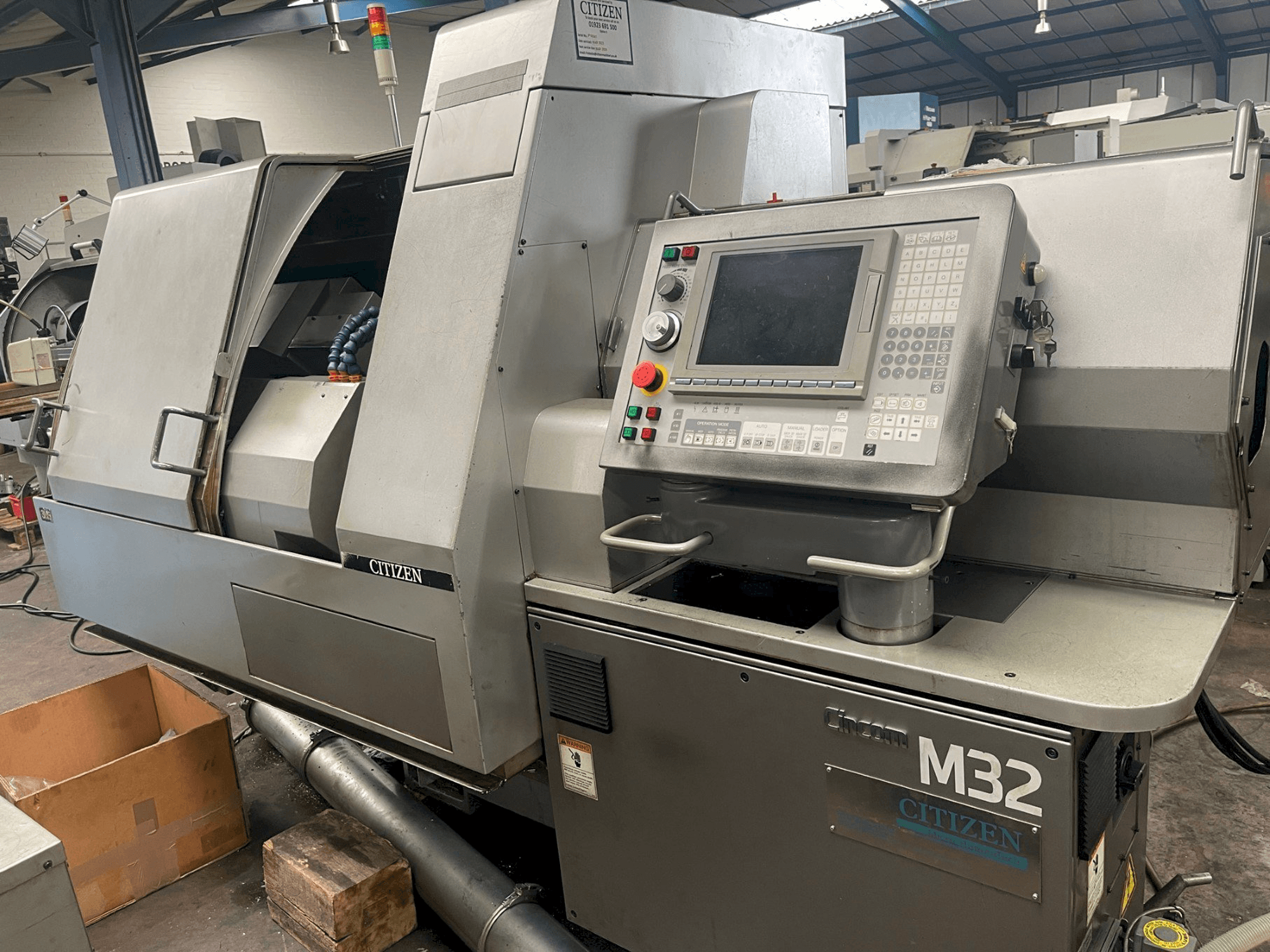 Makine Citizen M-32V - Önden görünüm