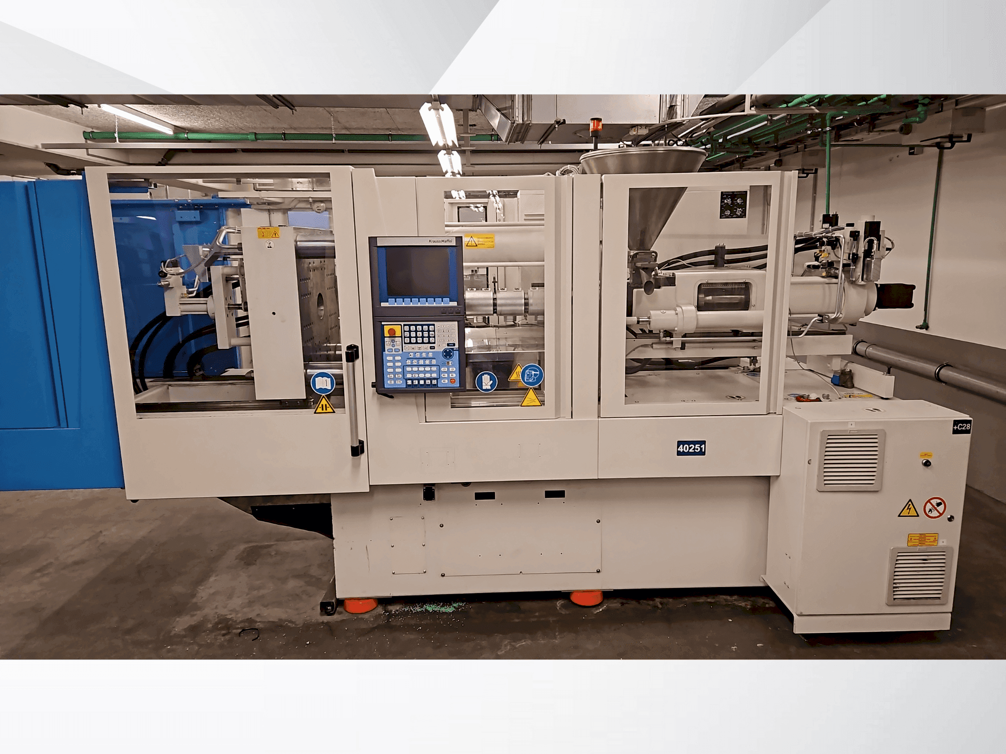 Makine Krauss Maffei 110-750 CX - Önden görünüm