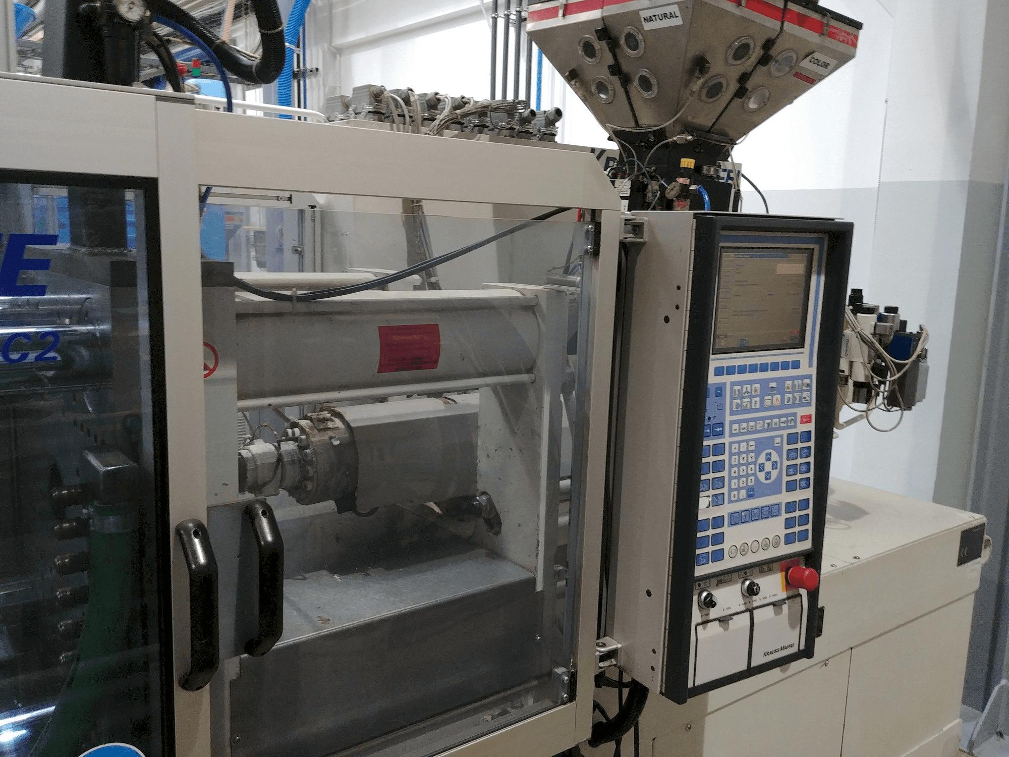 Makine Krauss Maffei KM 80-220 C - Sol görünüm