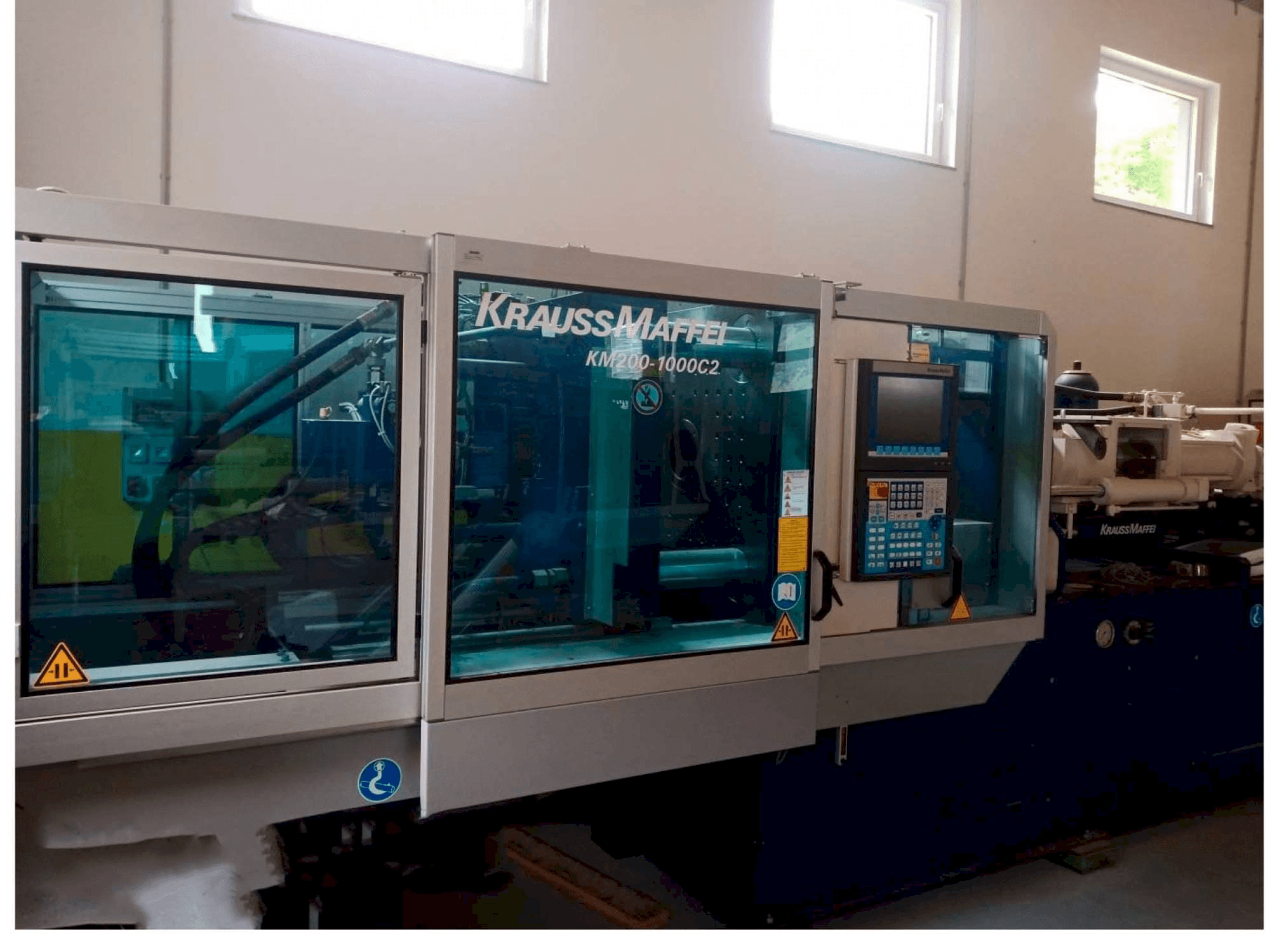 Makine Krauss Maffei KM 200/1000 - Önden görünüm