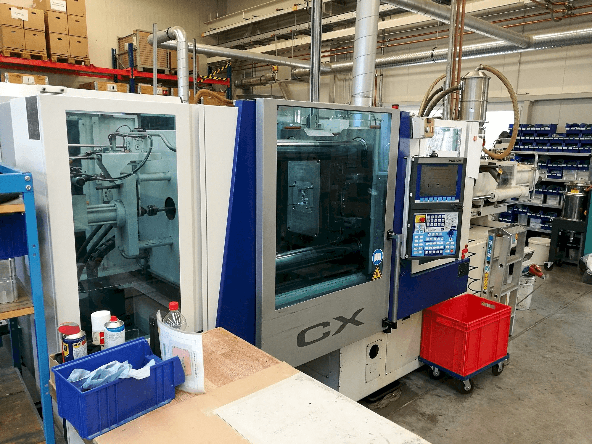 Makine Krauss Maffei 160-1000 CX - Önden görünüm