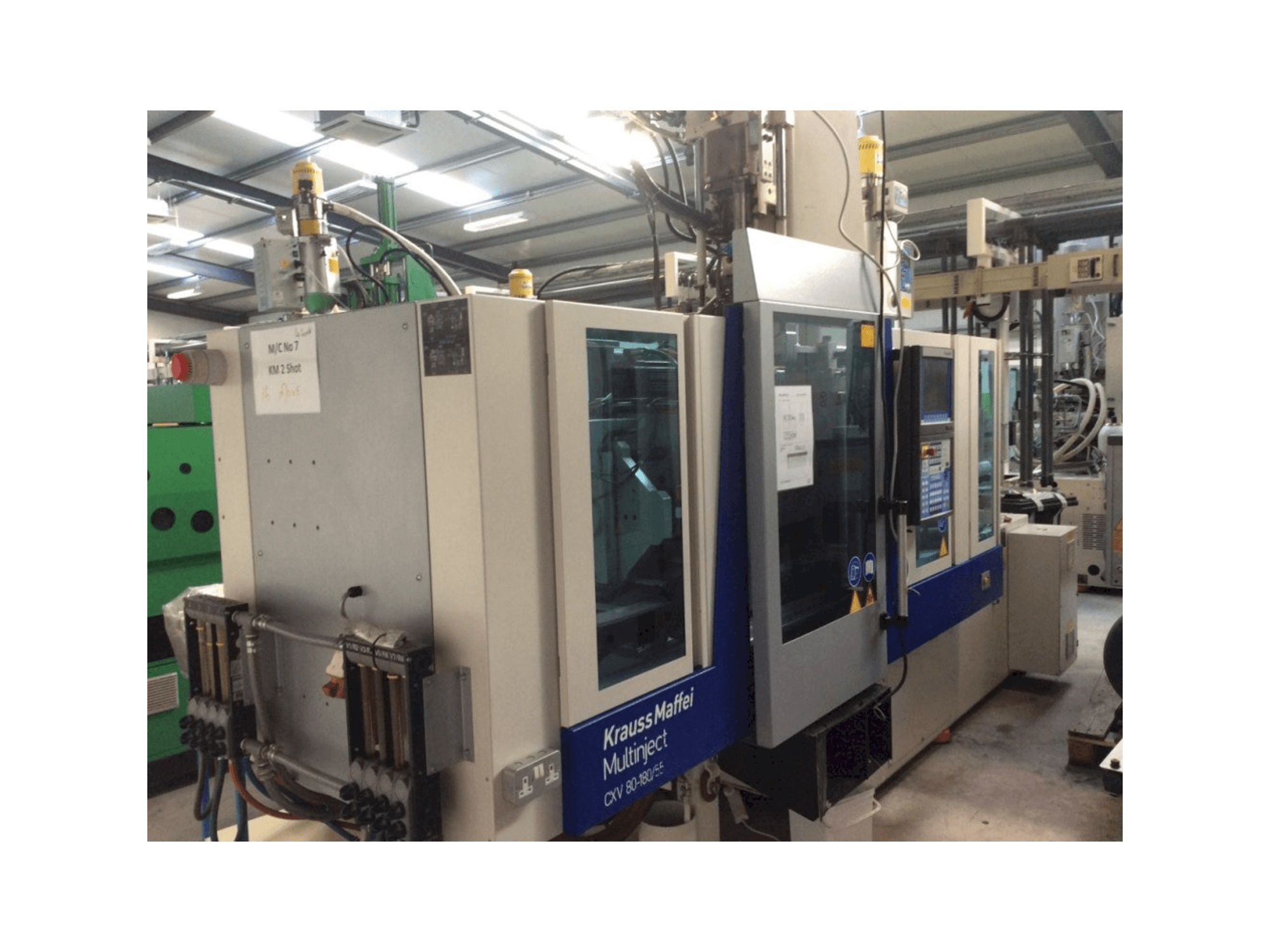 Makine Krauss Maffei Multinject 80-180-55 CX V - Önden görünüm