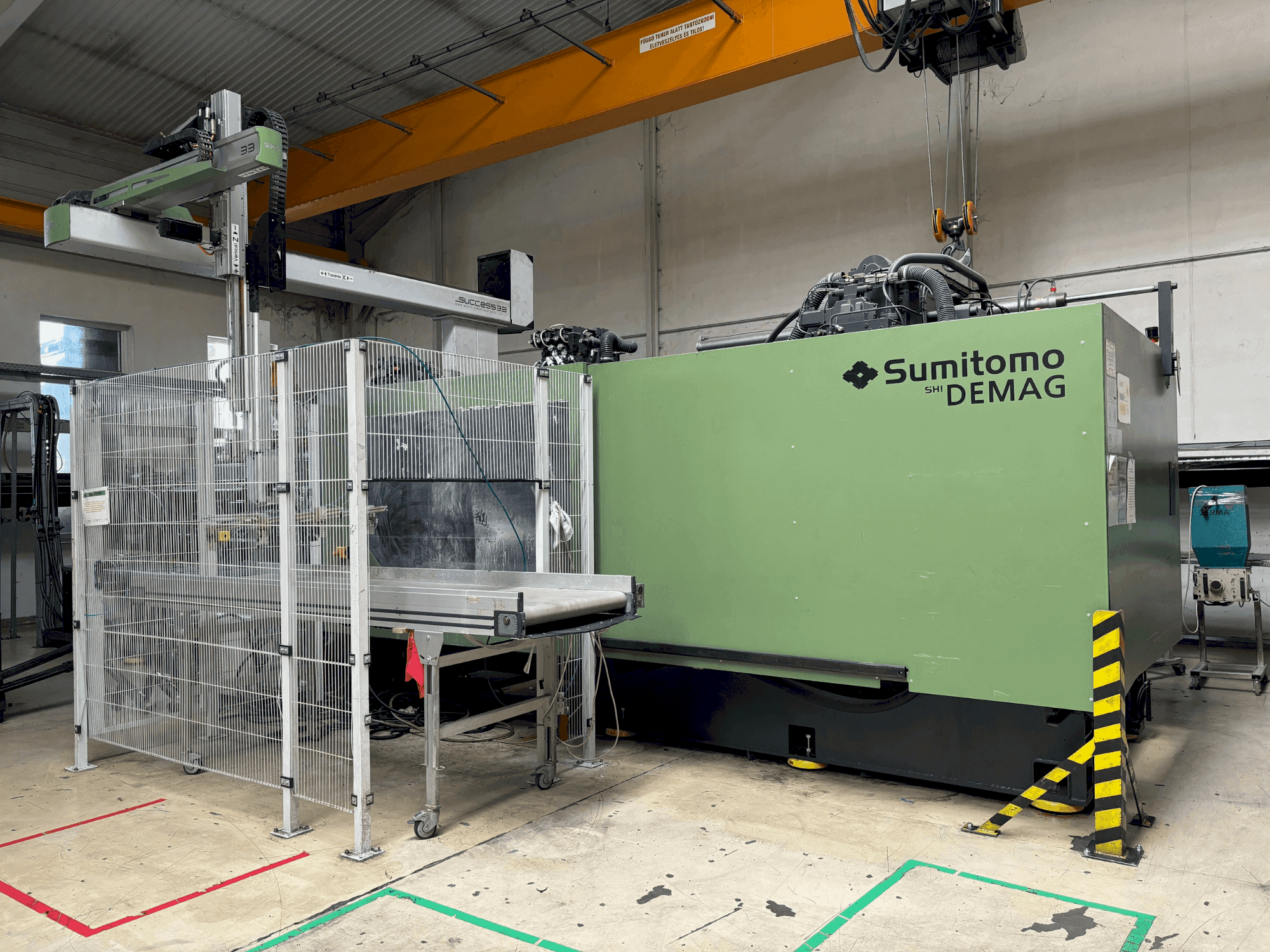 Makine SUMITOMO SHI DEMAG Systec 800/1120-6400 - Önden görünüm