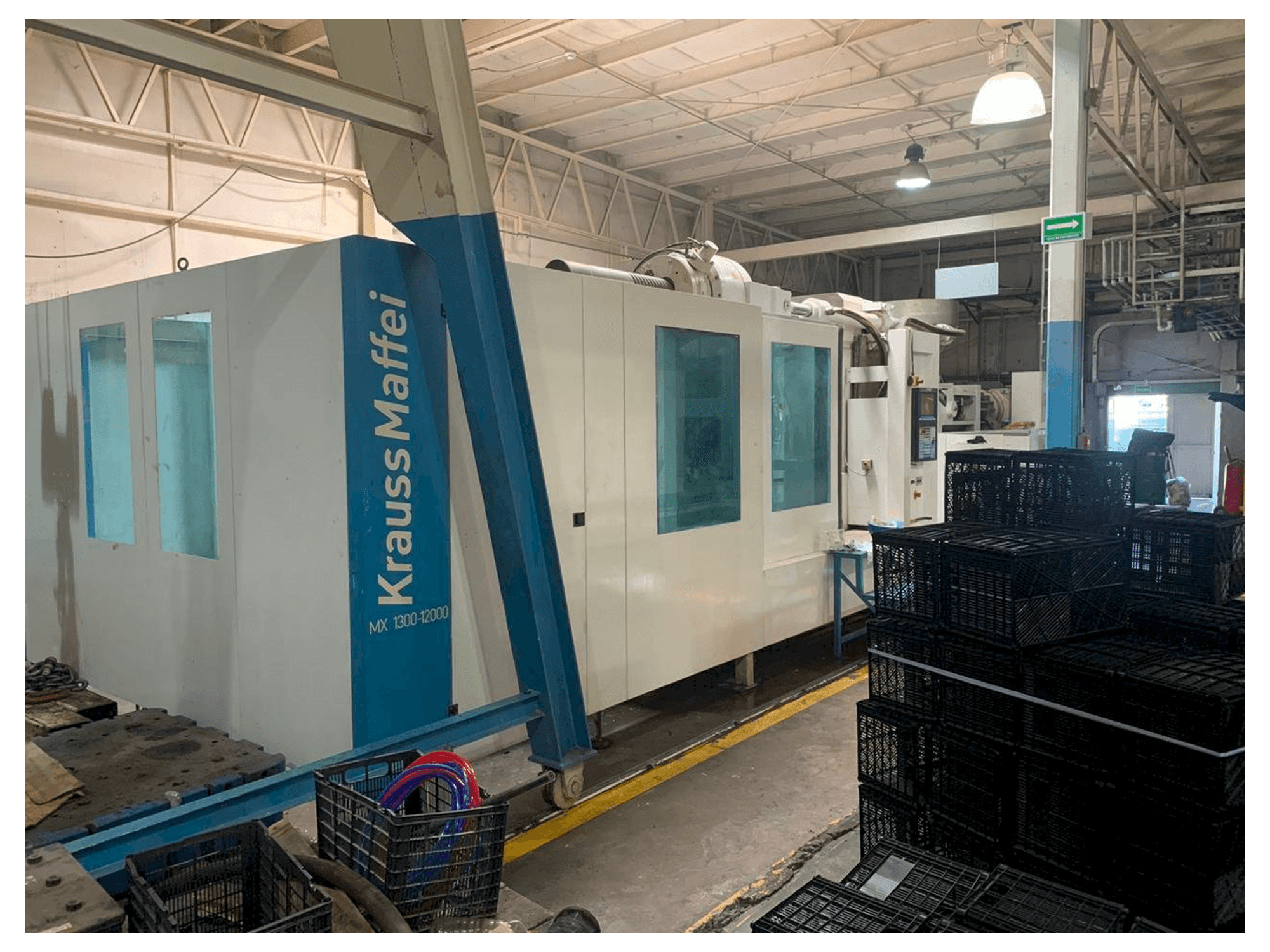 Makine Krauss Maffei 1300-12000 MX - Önden görünüm